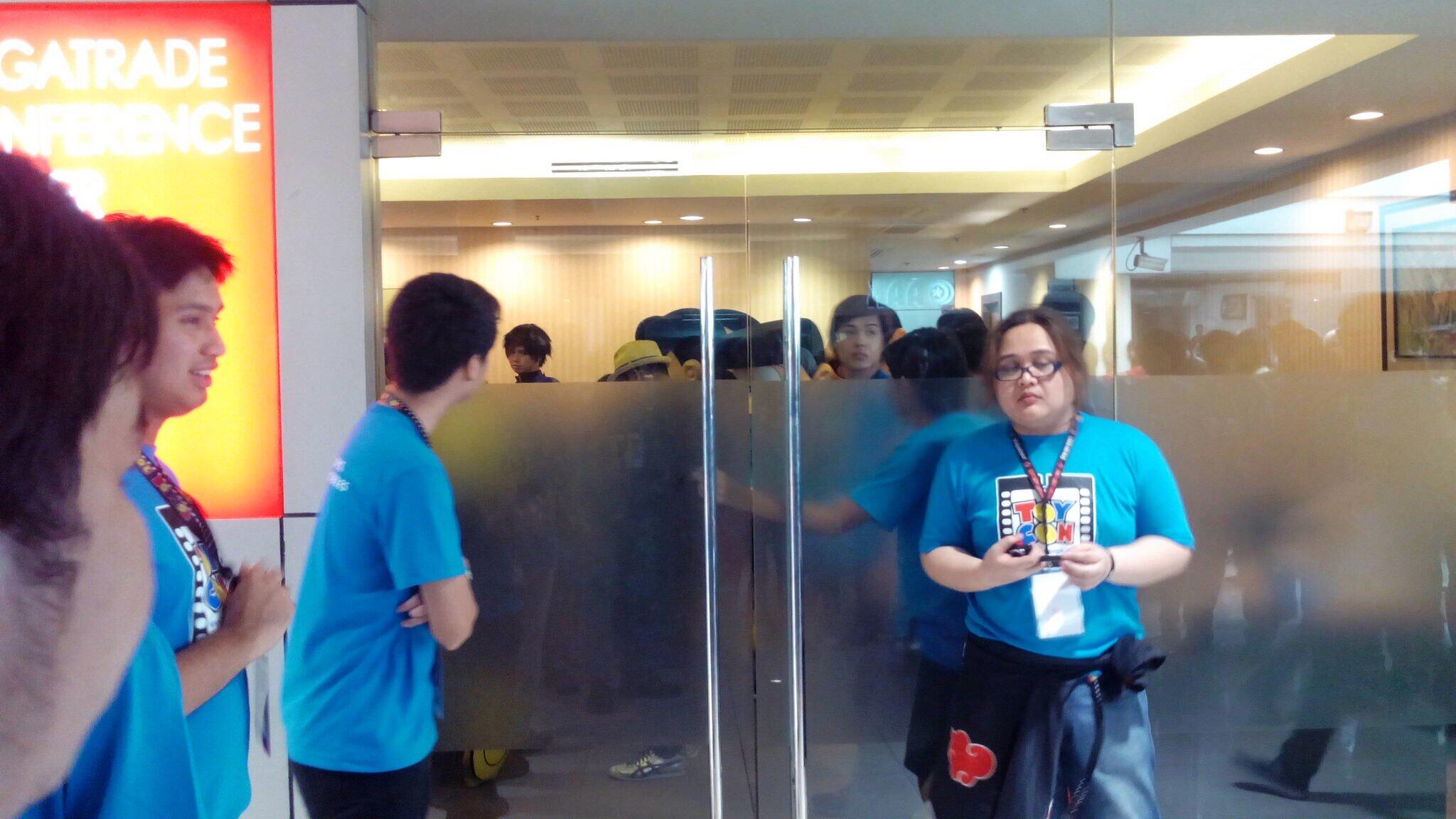 Marshalls are waiting for the go signal on when Doraemon and friends will come out of the Megatrade Conference Center and into the stage at Hall 3.